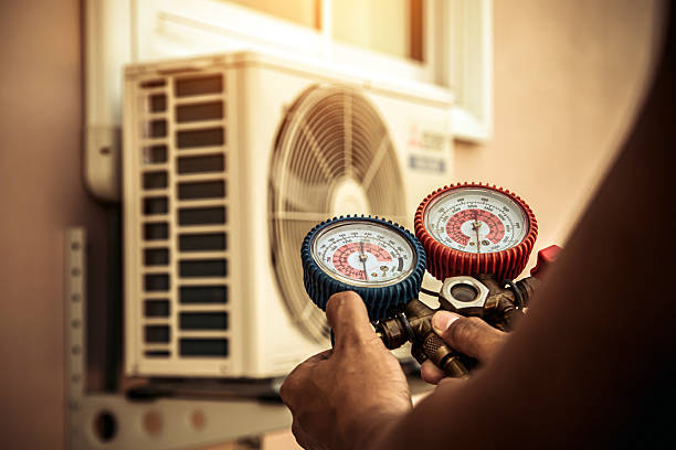 Professional Hvac technician working in Atkins, AR